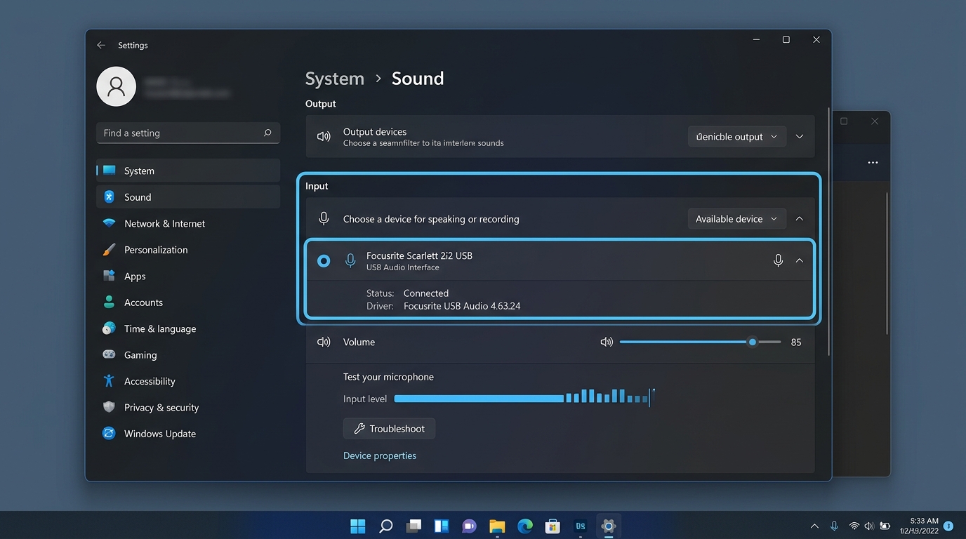 Windows 11 Settings window showing System > Sound with Focusrite Scarlett 2i2 USB selected under Input and active blue test microphone input level meter