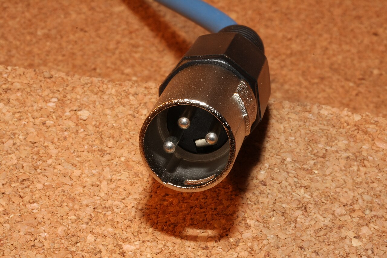 Close view of a three-pin XLR audio connector